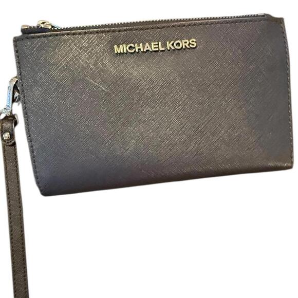 Michael Kors Stylish Slim Wallet with Wrist Strap - Picture 1 of 8